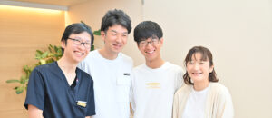患者様と微笑む院長